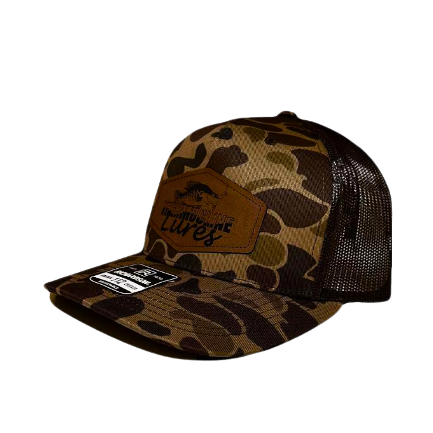 Side view of the Brook Duck Camo Brown Thermocline Lures hat featuring a brown leather patch with the logo, and camo mesh back.