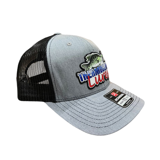 Right side view of the Thermocline Lures Grey and Black Richardson 112 Trucker Hat, highlighting its sleek design and mesh back.