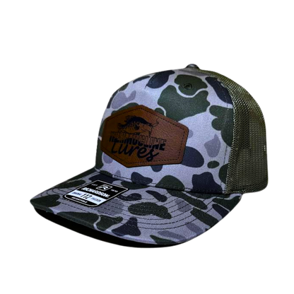 Side view of the Moss Duck Camo Light Green Thermocline Lures hat featuring a light green camo pattern and leather patch logo.