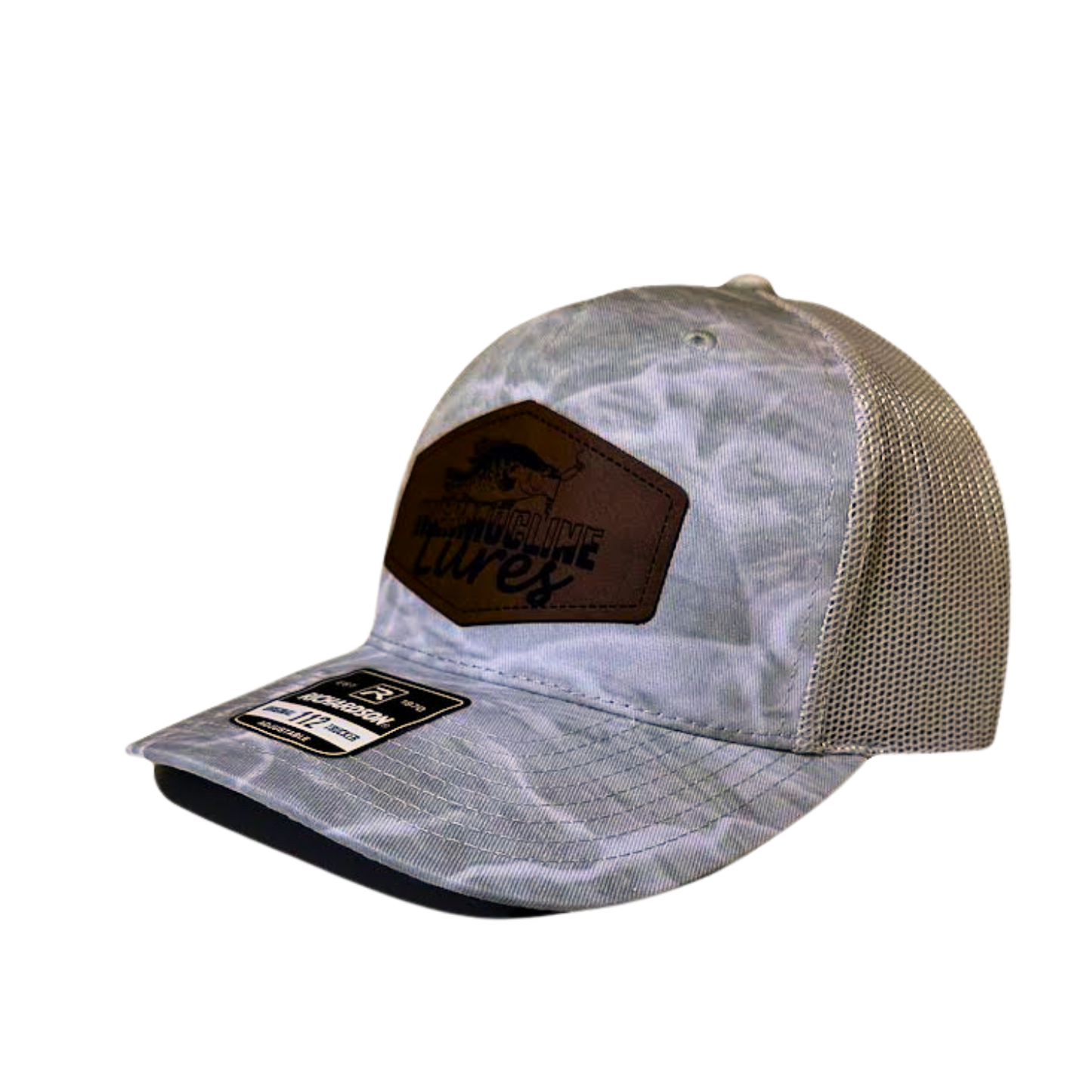 Side view of the Thermocline Lures gray Mossy Oak Break-Up Infinity camo trucker hat with a brown leather patch logo and adjustable mesh back for fishing enthusiasts.