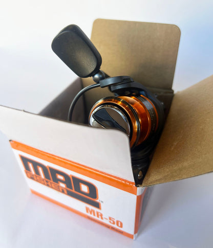 MadFishen MR50 spinning reel partially removed from its packaging, revealing its durable build and no-slip braid spool.