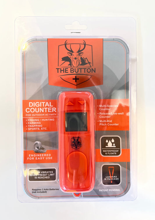 The Button Digital Fish Counter in its original packaging, highlighting key features such as waterproof design, multi-species tracking, and live-well counting. Engineered for easy use by anglers, hunters, and outdoor enthusiasts.